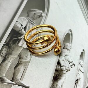 Spiral gold stainless steel ring